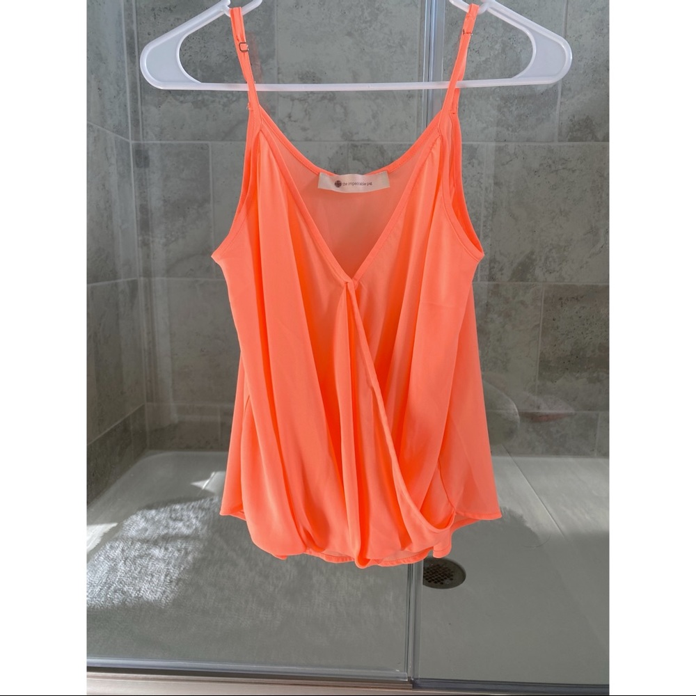 Bright orange top